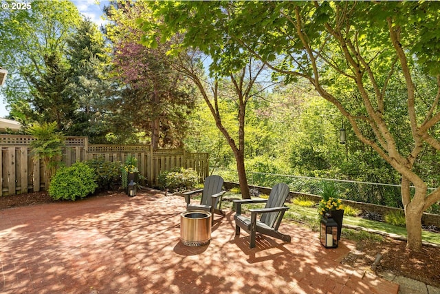 view of patio / terrace featuring fence