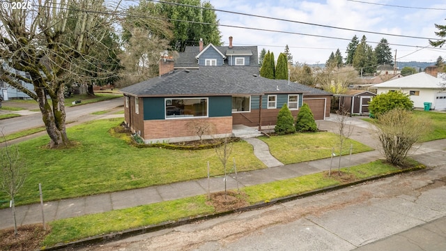 view of front of property with a chimney, a shingled roof, concrete driveway, an attached garage, and a front lawn