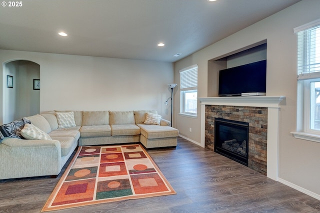 1531 Washington St, Independence, OR 97351 - living area featuring wood finished floors, arched walkways, plenty of natural light, and recessed lighting