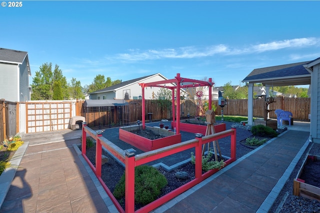 1531 Washington St, Independence, OR 97351 - view of playground featuring a vegetable garden and a fenced backyard