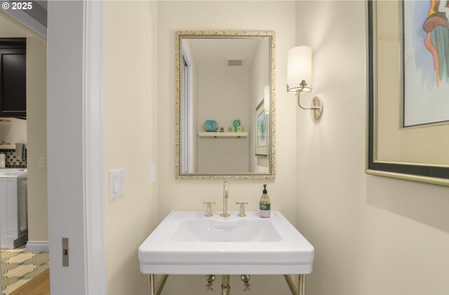 330 6th St, Lake Oswego, OR 97034 - bathroom featuring a sink and wood finished floors