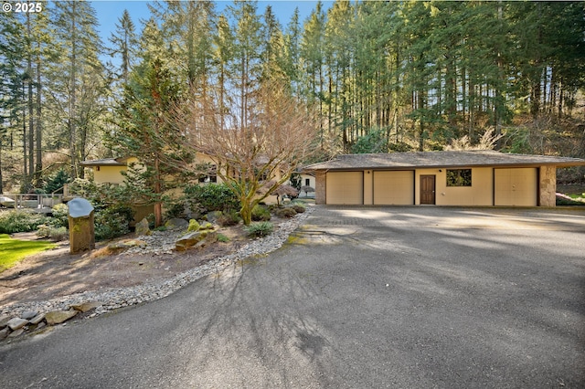 garage featuring driveway