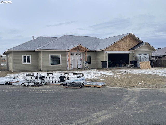 view of front of property with a garage