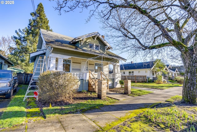 view of front of property featuring covered porch