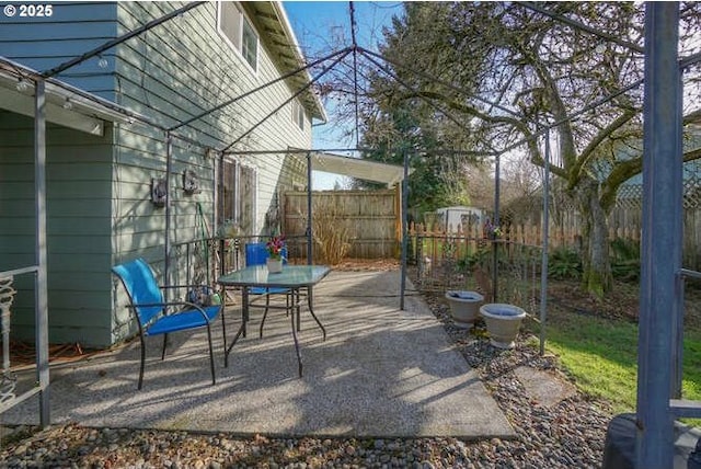 view of patio with fence