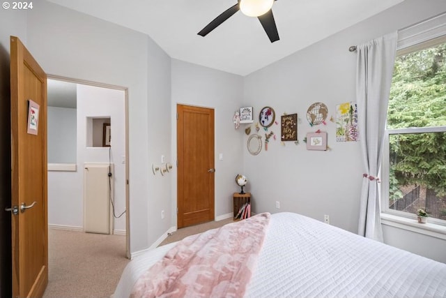 8427 NW Timber Ridge Ct, Portland, OR 97229 - bedroom featuring light colored carpet, baseboards, and ceiling fan