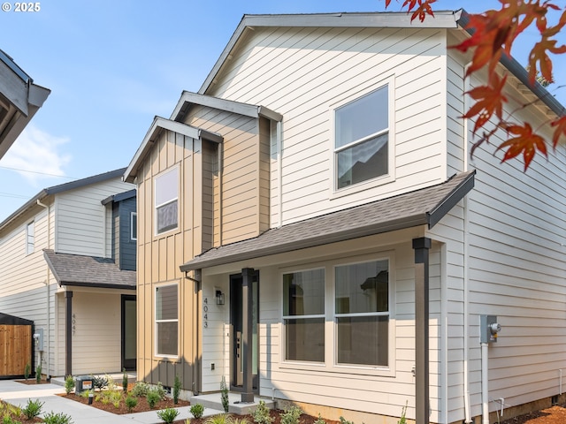 4043 SE 115th Ave, Portland, OR 97266 - view of front of home featuring board and batten siding and roof with shingles