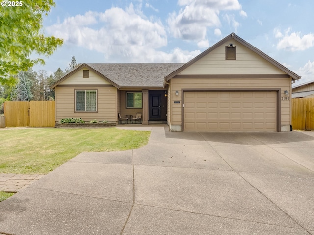 3190 Lily Ln, Mcminnville, OR 97128 - ranch-style home with concrete driveway and an attached garage