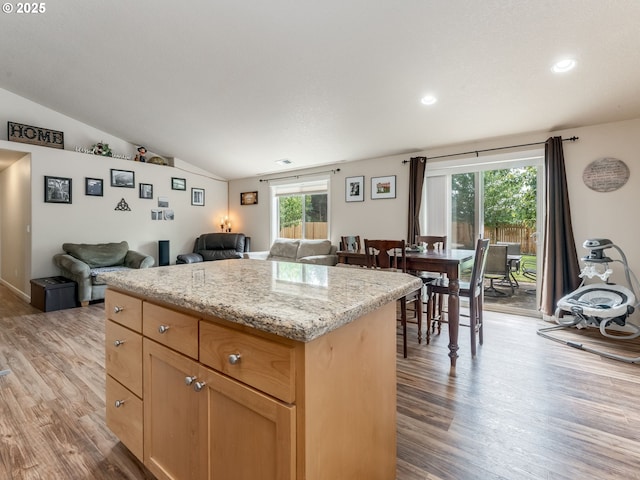 3190 Lily Ln, Mcminnville, OR 97128 - kitchen with open floor plan, light wood finished floors, a kitchen island, vaulted ceiling, and recessed lighting