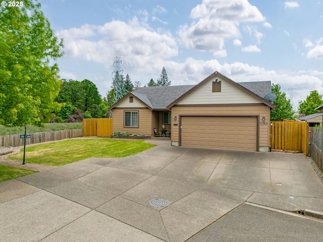 3190 Lily Ln, Mcminnville, OR 97128 - ranch-style home featuring concrete driveway, an attached garage, and a shingled roof