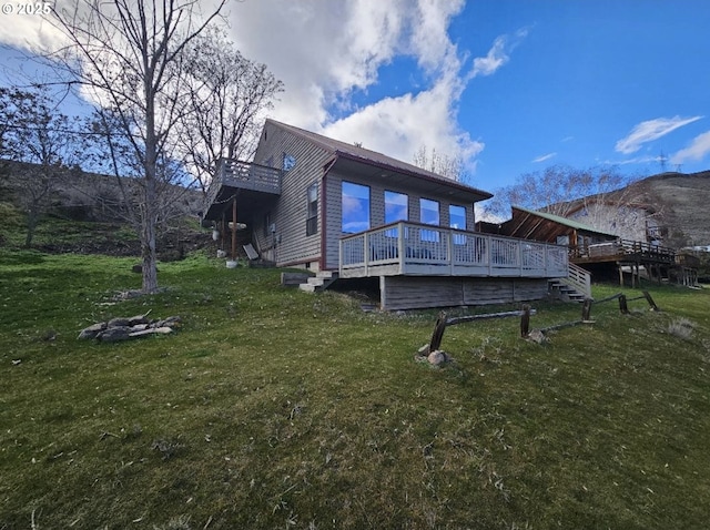 804 Riverside St, Maupin, OR 97037 - rear view of property featuring a deck and a yard