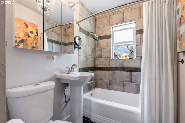full bath with shower / bath combo and toilet