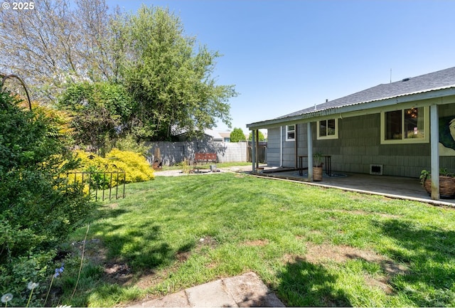 view of yard with fence