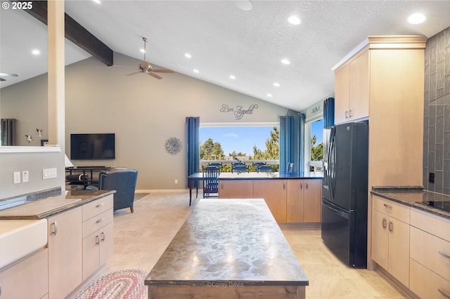8985 Chinook Ln, Manzanita, OR 97130 - kitchen featuring black appliances, a ceiling fan, light brown cabinets, a kitchen island, and recessed lighting