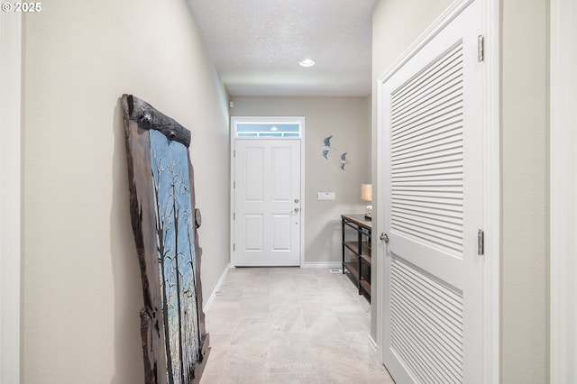 8985 Chinook Ln, Manzanita, OR 97130 - foyer with a textured ceiling and recessed lighting
