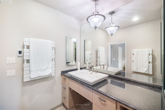 8985 Chinook Ln, Manzanita, OR 97130 - bathroom featuring vanity and baseboards