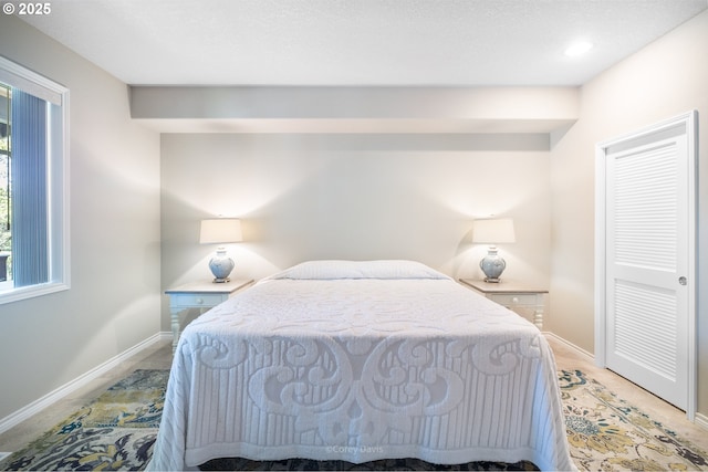 8985 Chinook Ln, Manzanita, OR 97130 - bedroom featuring baseboards
