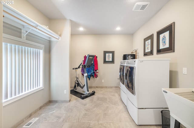 8985 Chinook Ln, Manzanita, OR 97130 - laundry area with washing machine and clothes dryer and recessed lighting