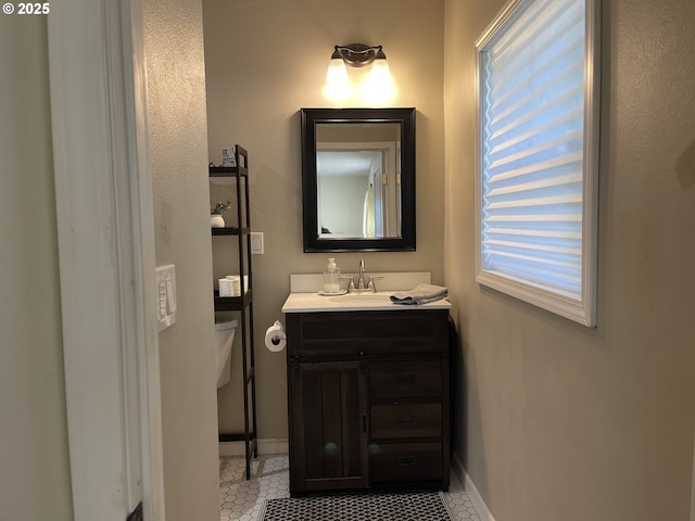 24291 SW Rogers Rd, Sheridan, OR 97378 - bathroom featuring tile patterned flooring, toilet, vanity, and baseboards