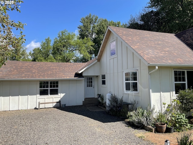 24291 SW Rogers Rd, Sheridan, OR 97378 - view of front of home with board and batten siding, entry steps, and roof with shingles