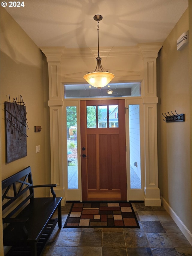 899 NW Angel Heights Rd, Stevenson, WA 98648 - foyer with baseboards and stone tile flooring