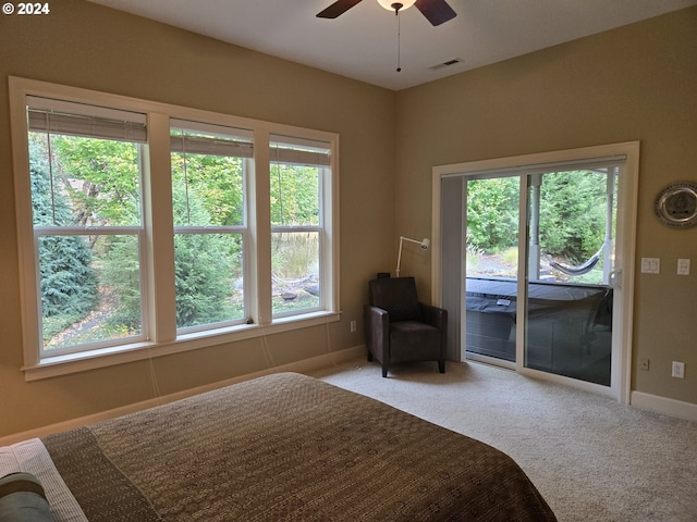 899 NW Angel Heights Rd, Stevenson, WA 98648 - bedroom with access to exterior, carpet, and baseboards