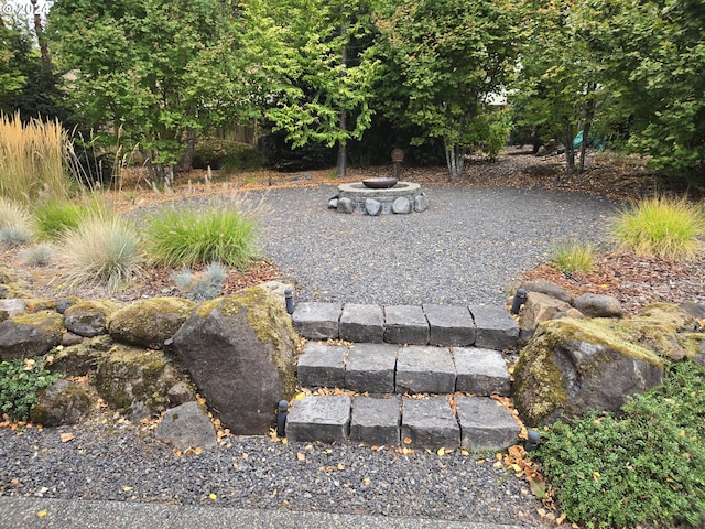 899 NW Angel Heights Rd, Stevenson, WA 98648 - view of yard with an outdoor fire pit