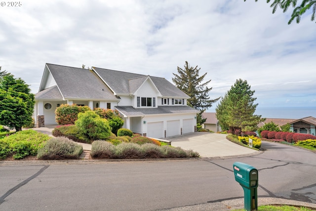 90955 Southview Ln, Florence, OR 97439 - view of front of house featuring driveway and a garage