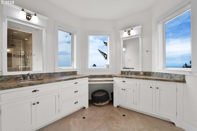 90955 Southview Ln, Florence, OR 97439 - bathroom with vanity, a stall shower, and tile patterned flooring