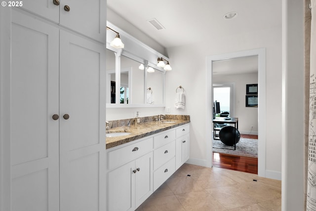 90955 Southview Ln, Florence, OR 97439 - full bath with double vanity, baseboards, and tile patterned floors