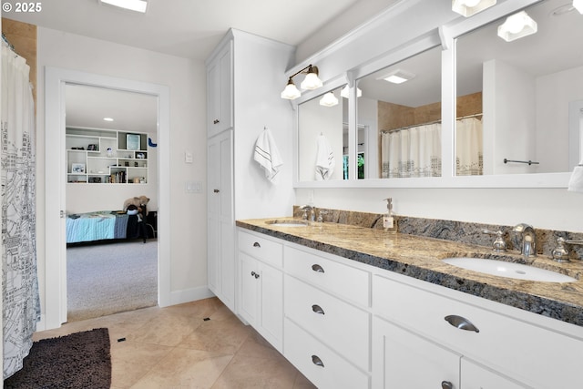 90955 Southview Ln, Florence, OR 97439 - full bathroom with double vanity, tile patterned flooring, and curtained shower