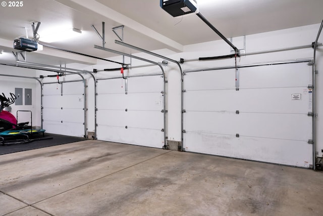 90955 Southview Ln, Florence, OR 97439 - garage with a garage door opener and electric panel