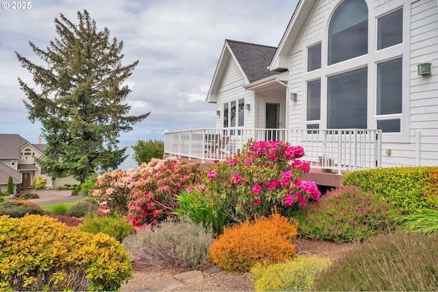 90955 Southview Ln, Florence, OR 97439 - view of home's exterior with roof with shingles