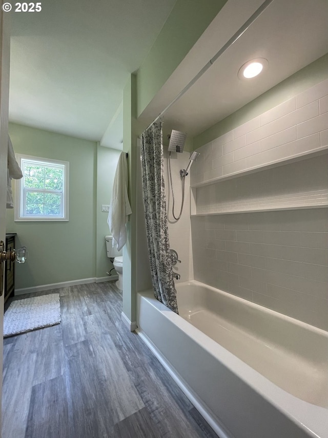 1830 N Winchell St, Portland, OR 97217 - full bath featuring toilet, shower / tub combo, wood finished floors, and baseboards