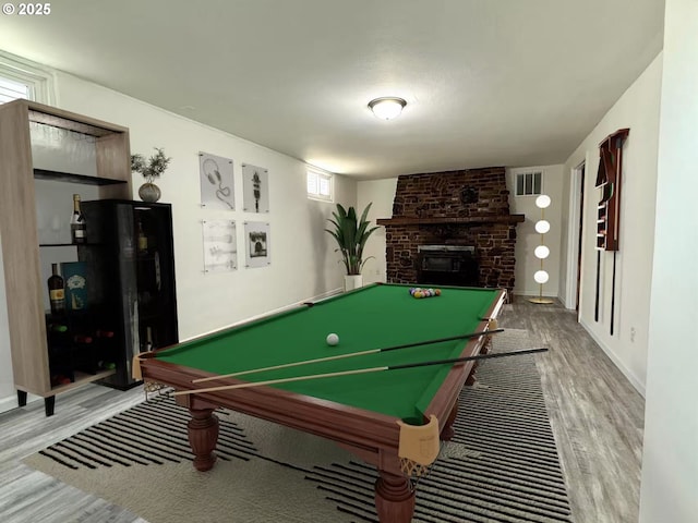 1830 N Winchell St, Portland, OR 97217 - game room with wood finished floors, a fireplace, billiards, and baseboards