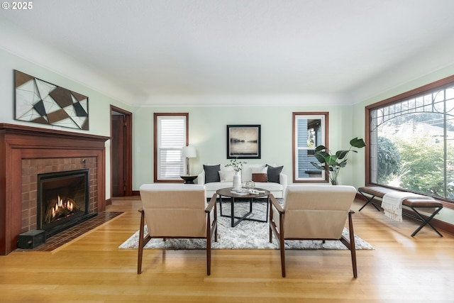 1830 N Winchell St, Portland, OR 97217 - living room featuring light wood-style floors and a fireplace
