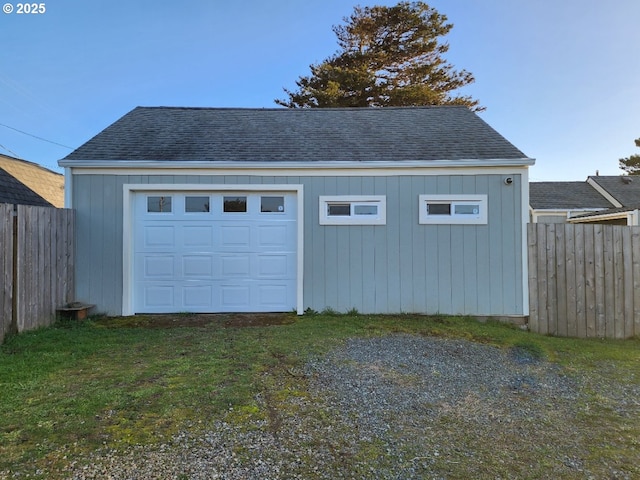 garage with fence