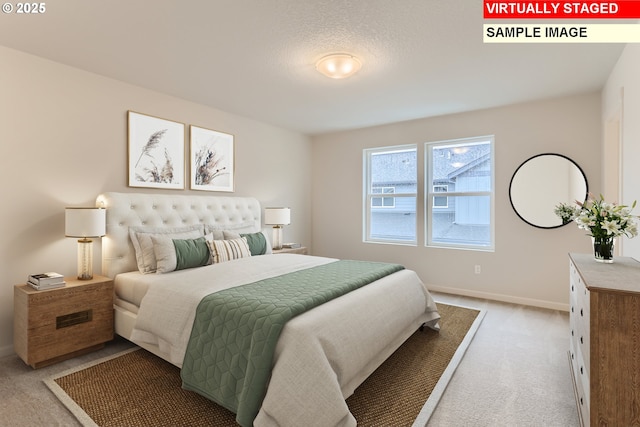 bedroom featuring light carpet and baseboards