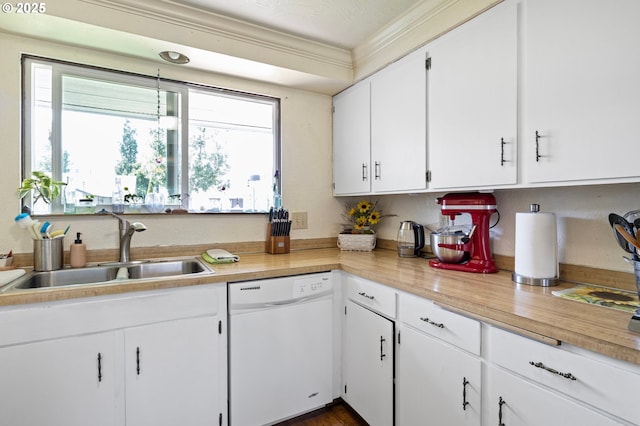 4635 Daisy St, Springfield, OR 97478 - kitchen with dishwasher, white cabinets, light countertops, and crown molding