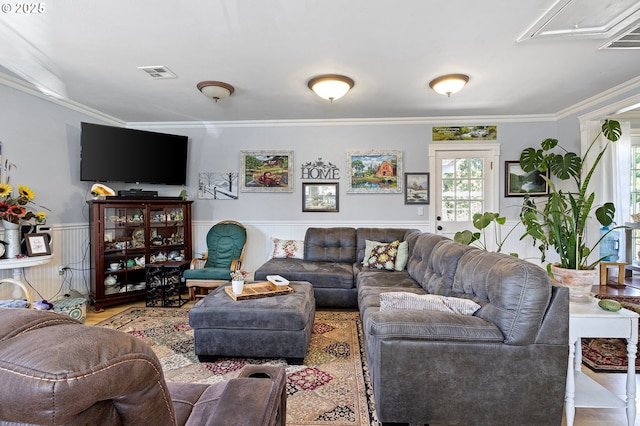 4635 Daisy St, Springfield, OR 97478 - living room with crown molding, healthy amount of natural light, wood finished floors, and wainscoting