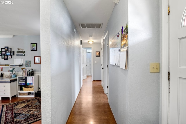 4635 Daisy St, Springfield, OR 97478 - hall with a textured wall, attic access, and dark wood finished floors