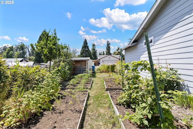 4635 Daisy St, Springfield, OR 97478 - view of yard with a vegetable garden