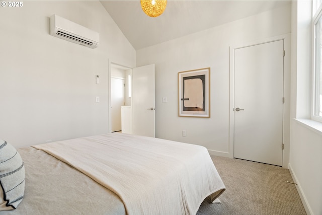 bedroom featuring baseboards, light colored carpet, an AC wall unit, and vaulted ceiling