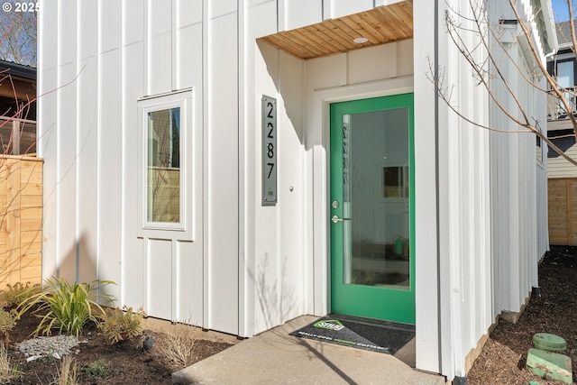 property entrance with board and batten siding