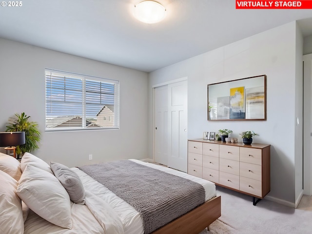 1555 Nolan Ave SE, Albany, OR 97322 - bedroom with light colored carpet, baseboards, and a closet