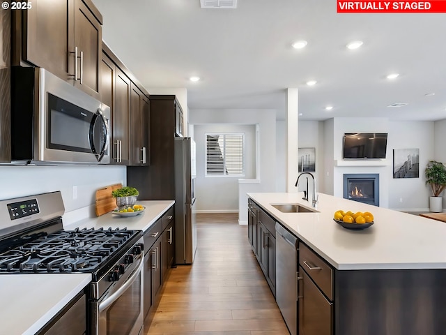 1555 Nolan Ave SE, Albany, OR 97322 - kitchen featuring stainless steel appliances, a sink, light countertops, and recessed lighting