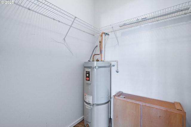 utility room with secured water heater