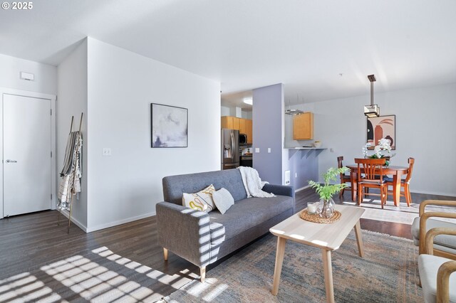 living room featuring dark hardwood / wood-style floors