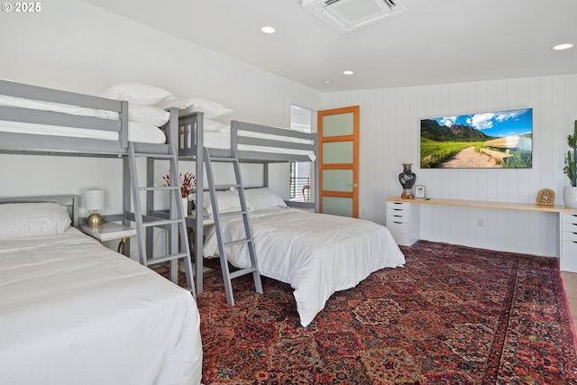 bedroom with recessed lighting and visible vents