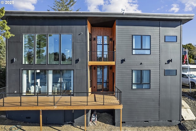 rear view of house featuring crawl space